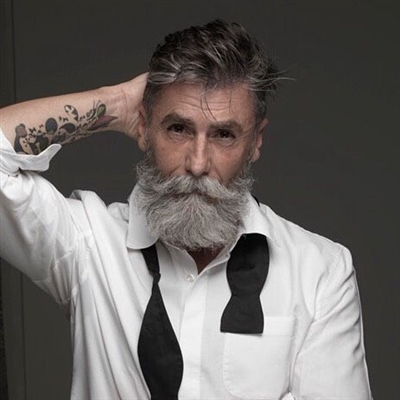 60-year-old pensioner became a fashion model, growing a beard
